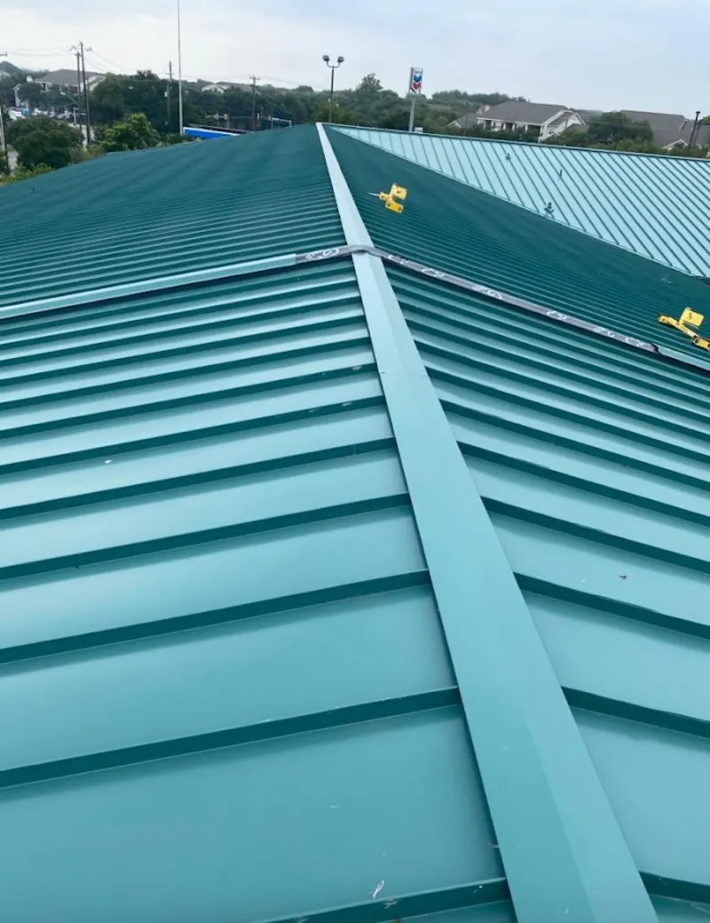 Green commercial metal roof ridge and valley for Metal Roof Repair in Burleson