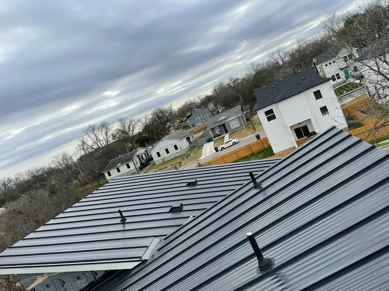 Standing seam metal roof panels with vents for Skylight Repair in Burleson
